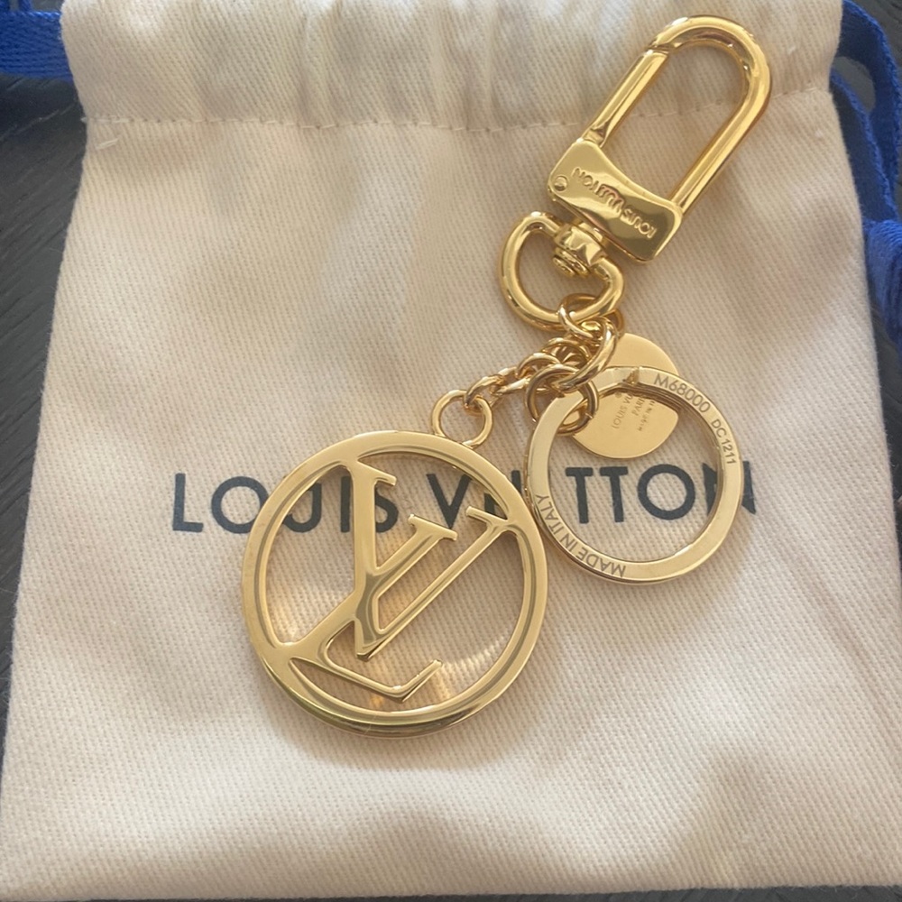 Brand new, never been used LV Bag Charm Gold